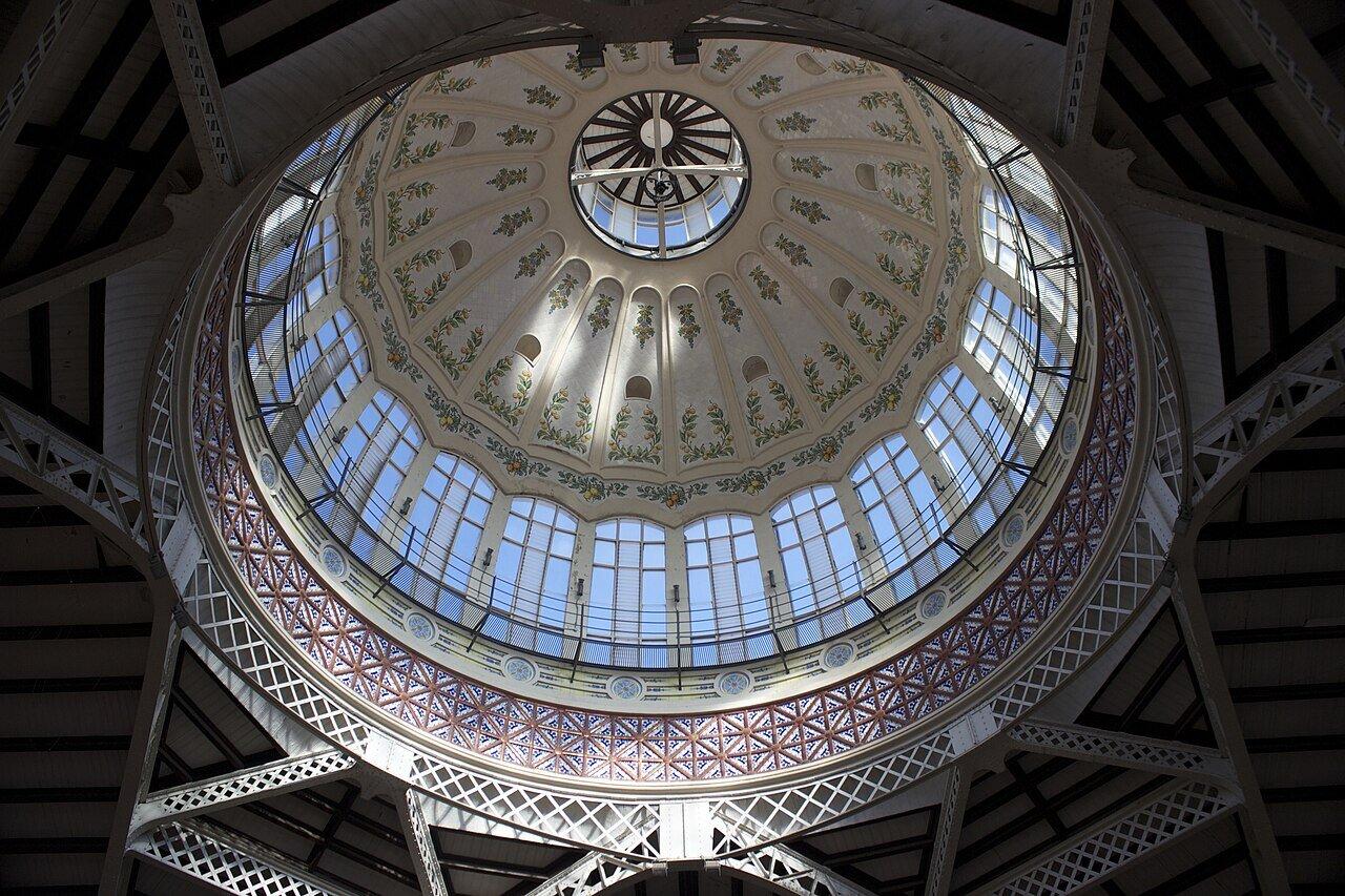 Decorated dome and steel roof supports inside Valencia’s Central Market